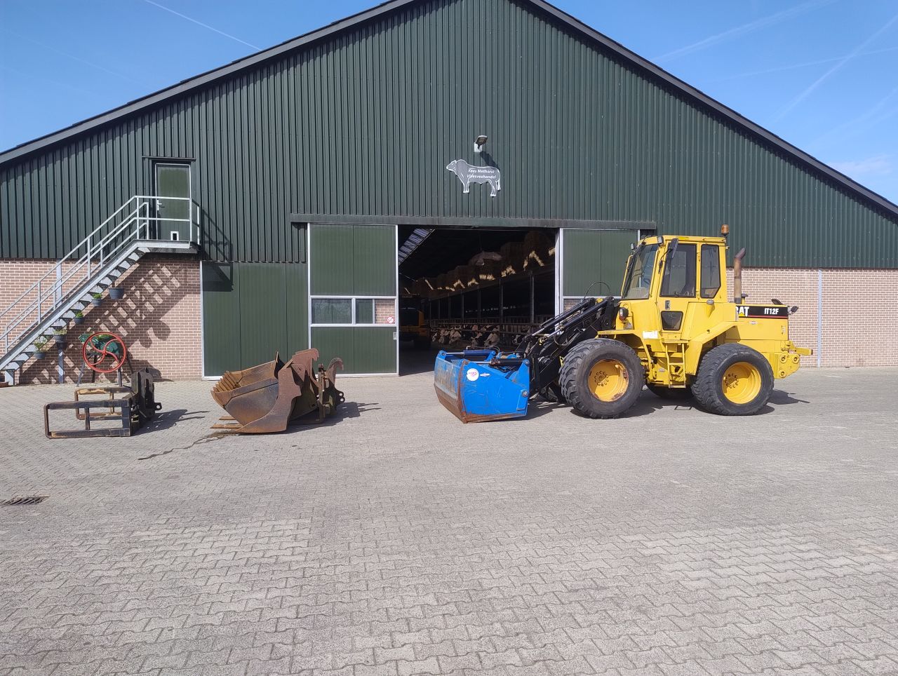 Shovel CAT IT12F +voerhapper bak puinbak/grasvork palletvork