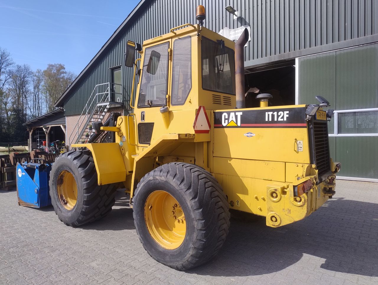 Shovel CAT IT12F +voerhapper bak puinbak/grasvork palletvork