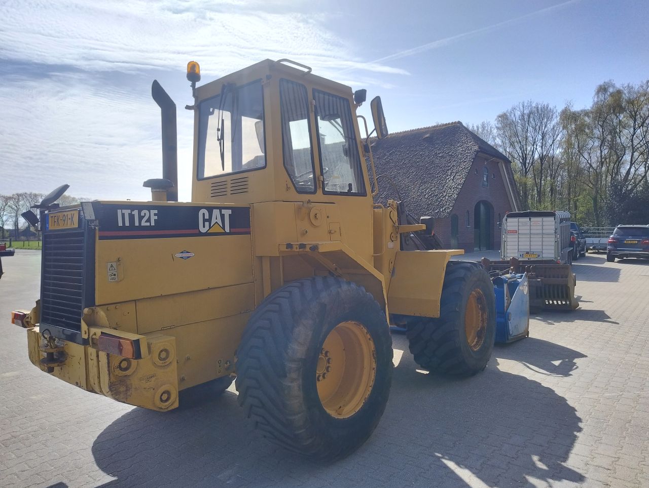 Shovel CAT IT12F +voerhapper bak puinbak/grasvork palletvork