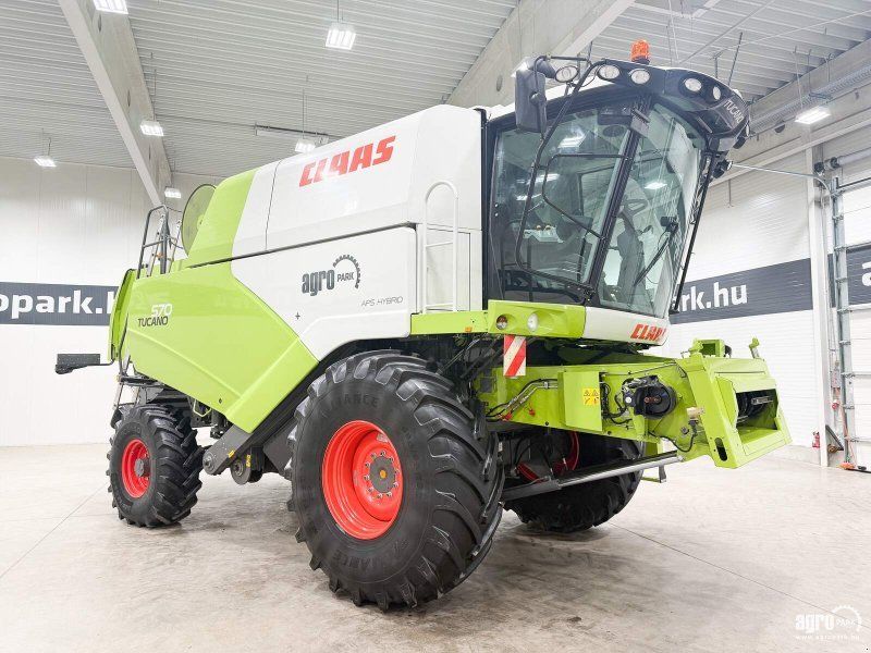 Claas Tucano 570 4WD APS Hybrid rotor system, 6.6 m V660 header, trans