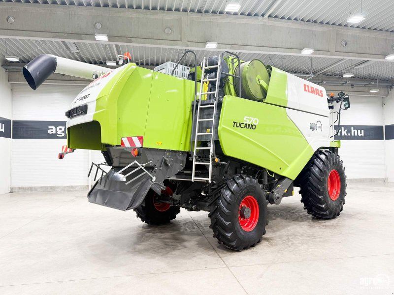 Claas Tucano 570 4WD APS Hybrid rotor system, 6.6 m V660 header, trans