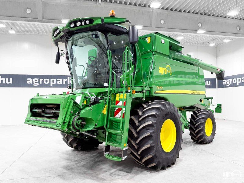 John Deere T670 6 straw walkers, 7,6 m 625R header, transport trolley, rape
