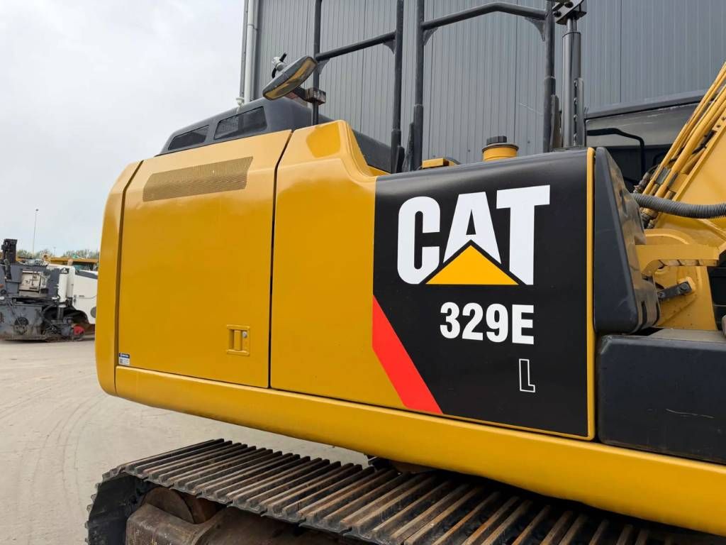 CAT 329E L - NEW CHAINS AND TRACKS