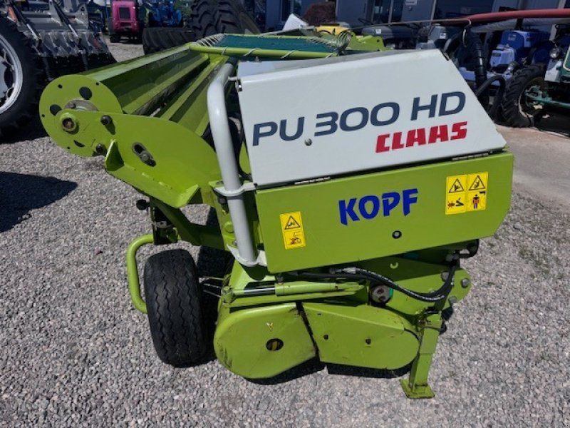 Claas PU 300 HD L PRO mit Rollenniederhalter