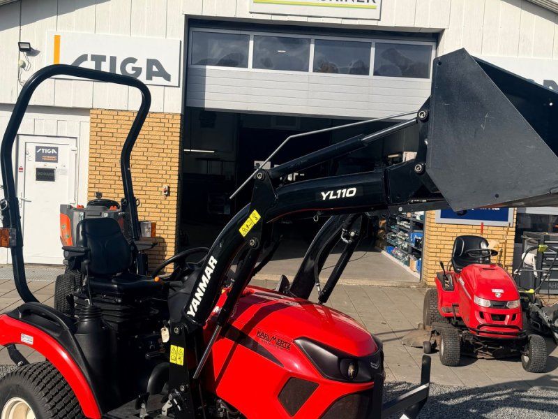 Yanmar SA 221 med klippebord og frontlæsser