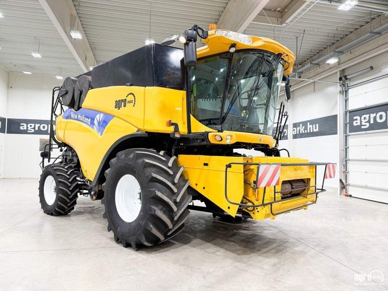 New Holland CR9090 4WD rotor, 10,7 m Varifeed header with trolley, 90060R32