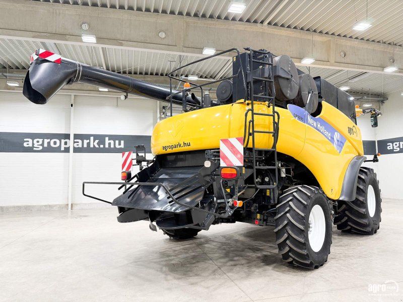 New Holland CR9090 4WD rotor, 10,7 m Varifeed header with trolley, 90060R32