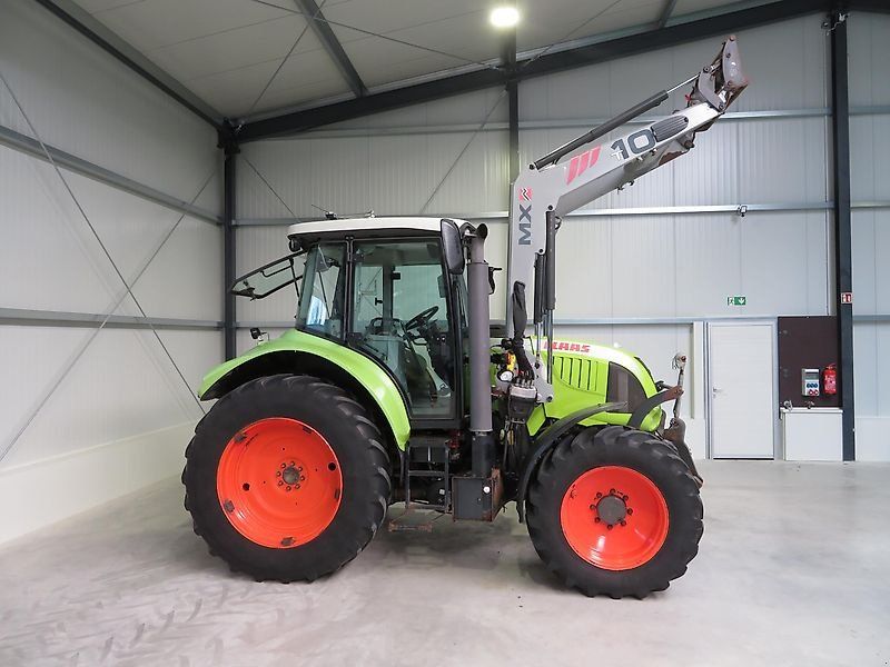 Claas Arion 520 mit Frontlader+DL+Klima+FKH