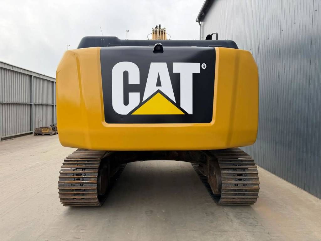 CAT 329E L - NEW CHAINS AND TRACKS