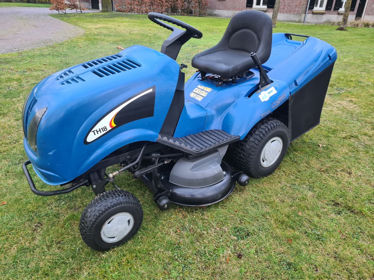 New Holland TH18 zitmaaier met opvangbak hydrostaat.