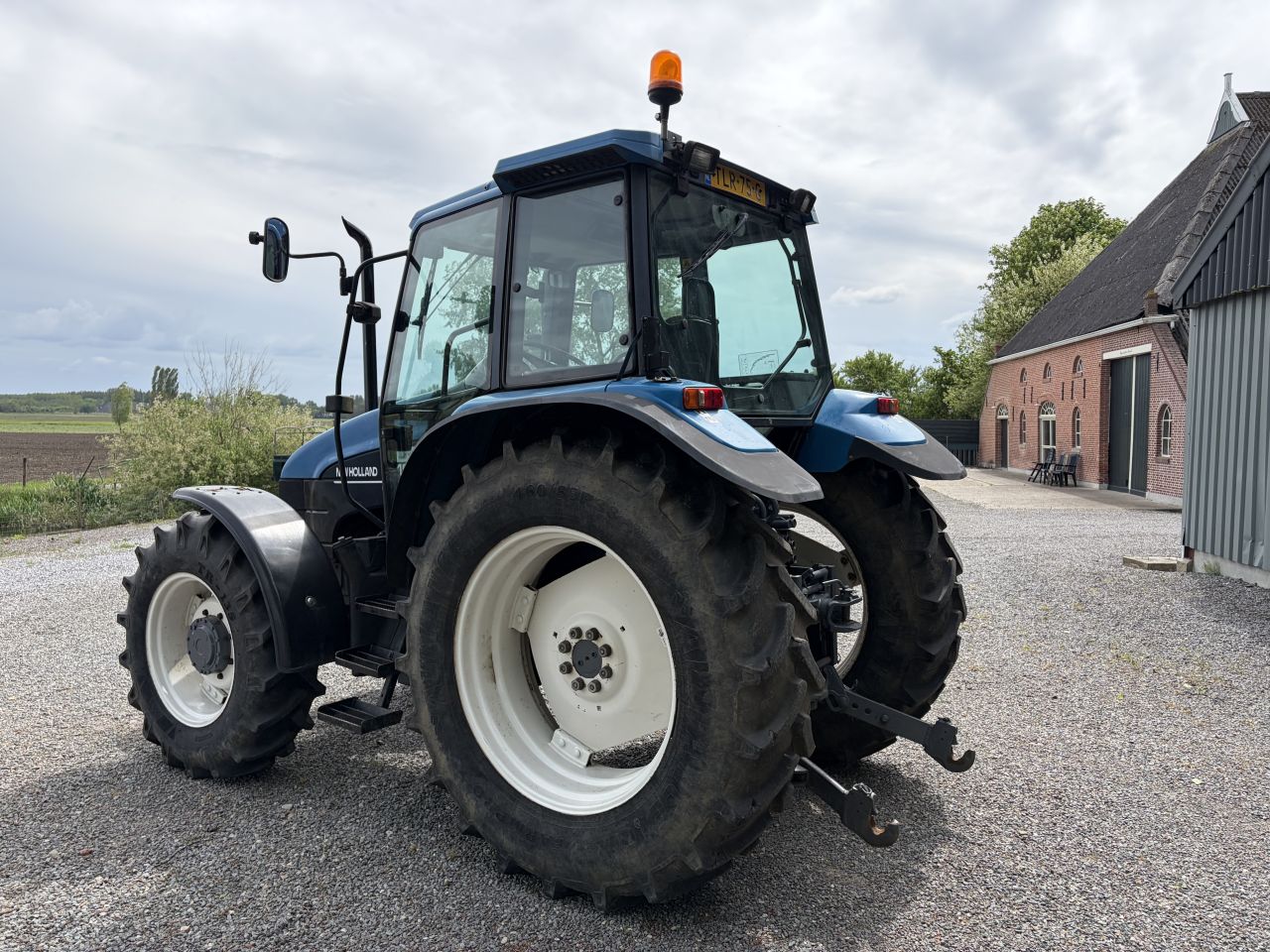 New Holland TS100 kruipbak