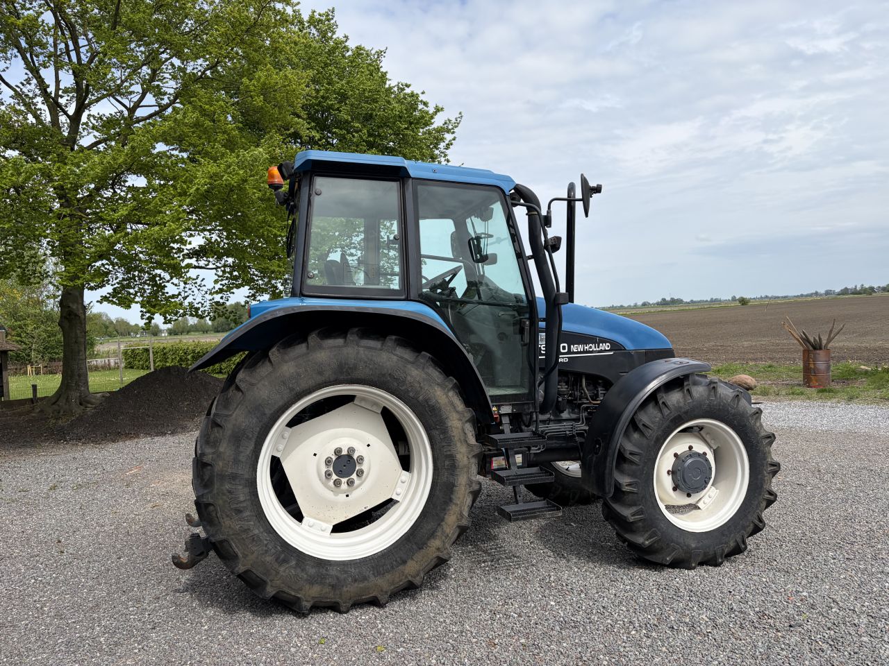 New Holland TS100 kruipbak
