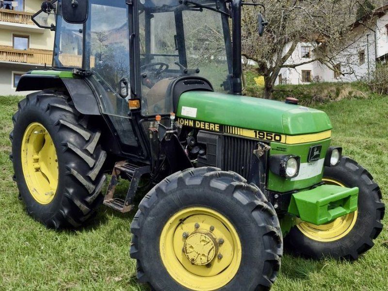 John Deere 1950 CC2 + Frontlader
