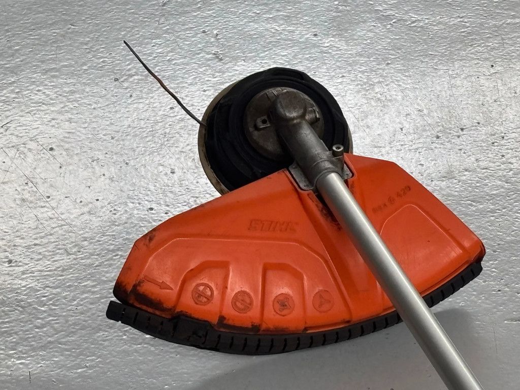 Stihl FS89 gebruikte bosmaaier met messen en draadkop