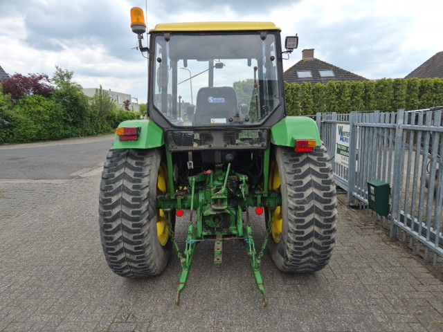 John Deere 1640 MC1 met fronthef.