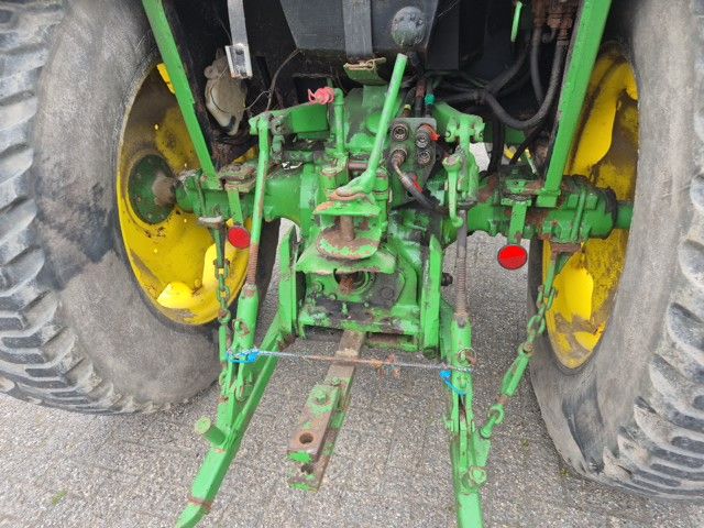 John Deere 1640 MC1 met fronthef.
