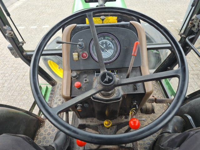 John Deere 1640 MC1 met fronthef.