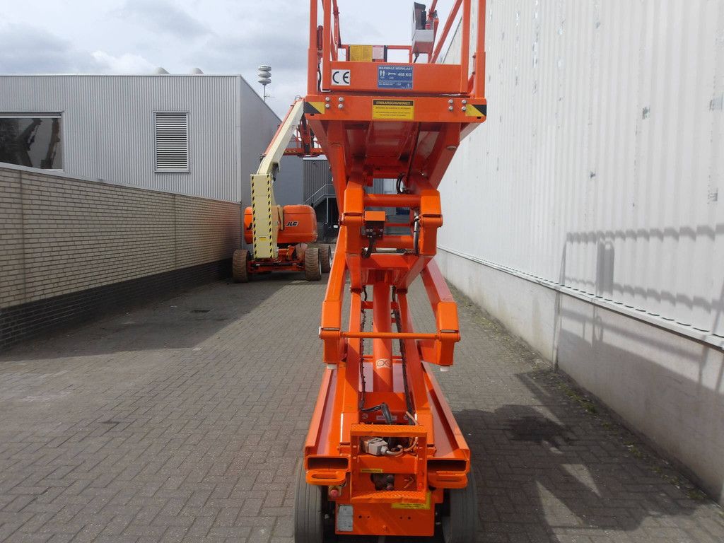 Schaarhoogwerker SkyJack SJ3220 8.09m Elektrisch 2015