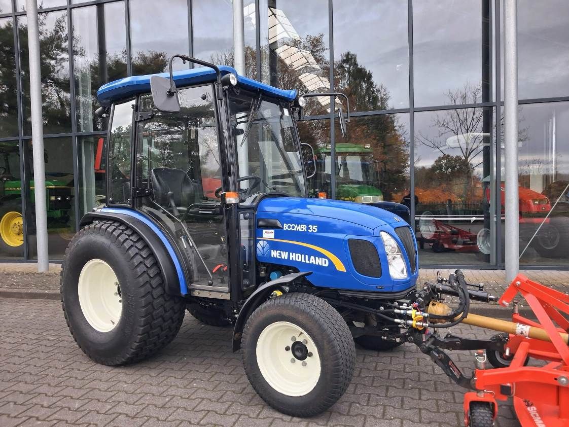 New Holland Boomer 35 + frontmaaier