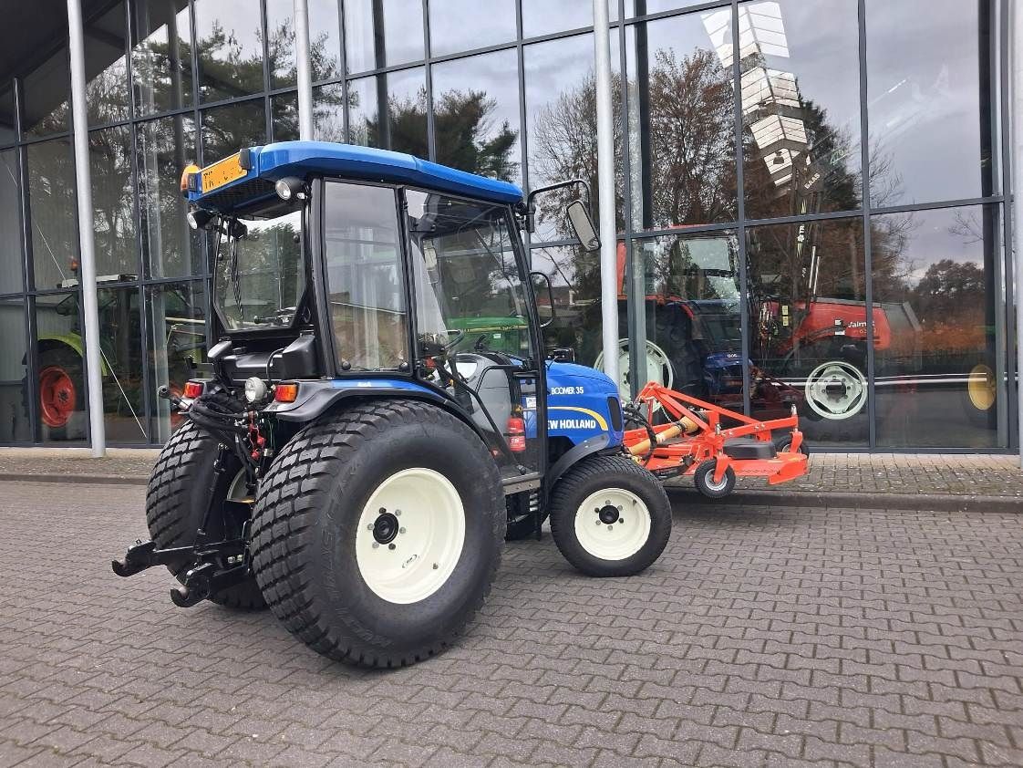 New Holland Boomer 35 + frontmaaier