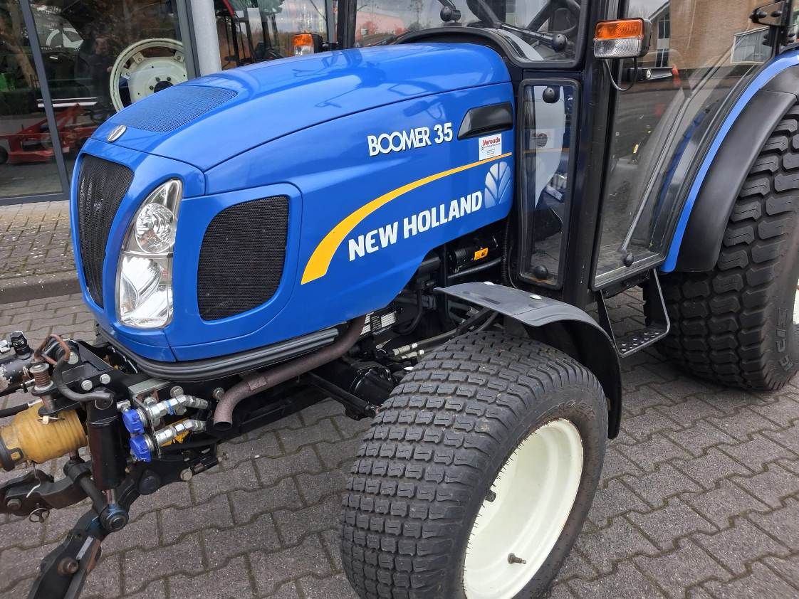 New Holland Boomer 35 + frontmaaier