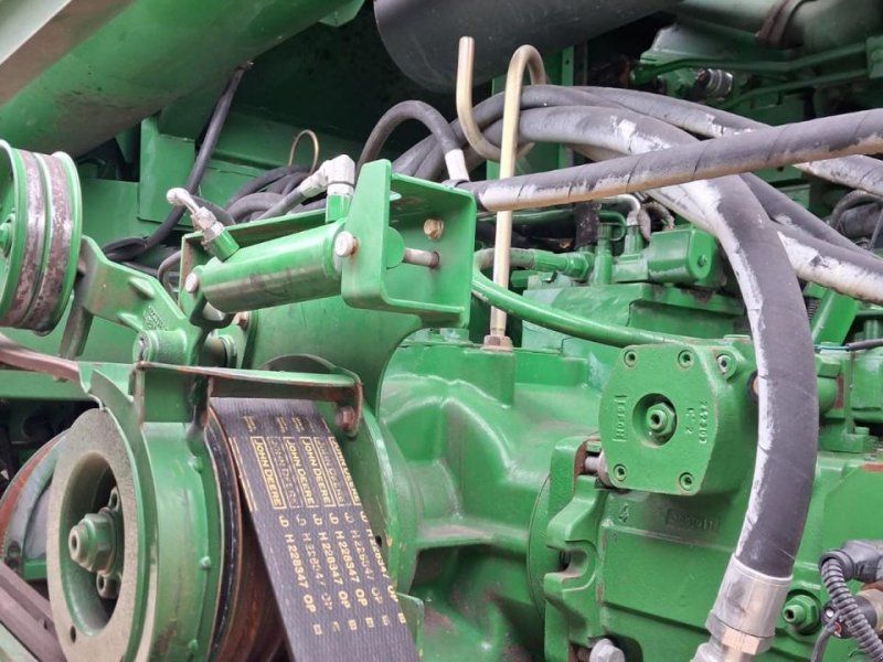 John Deere S 690i mit 2 Schneidwerken