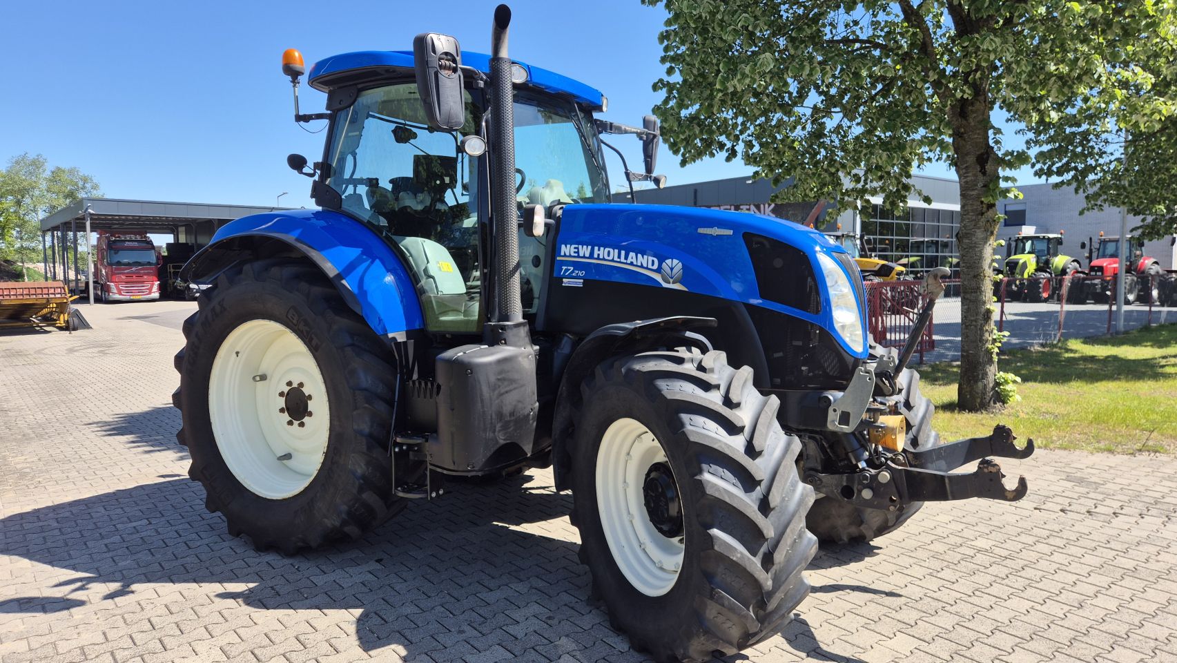 New Holland T7.210 AC 40Kmh. Lucht, Fronthef en PTO