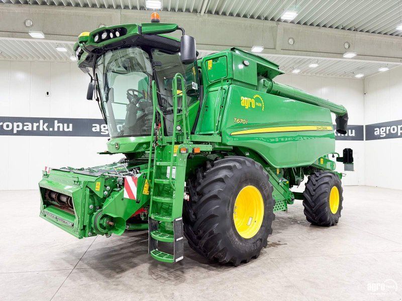 John Deere T670i 6 walkers, 9.15m 630X Vario header, trailer, side knives,