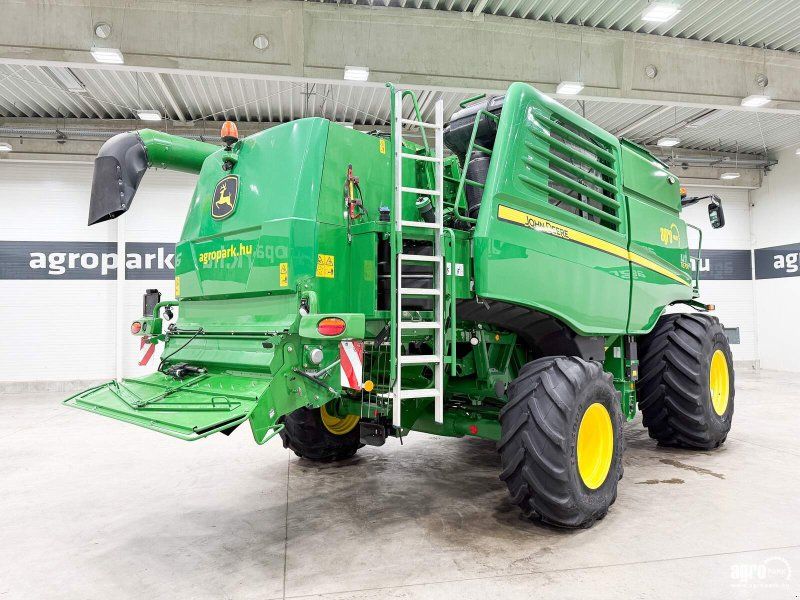 John Deere T670i 6 walkers, 9.15m 630X Vario header, trailer, side knives,