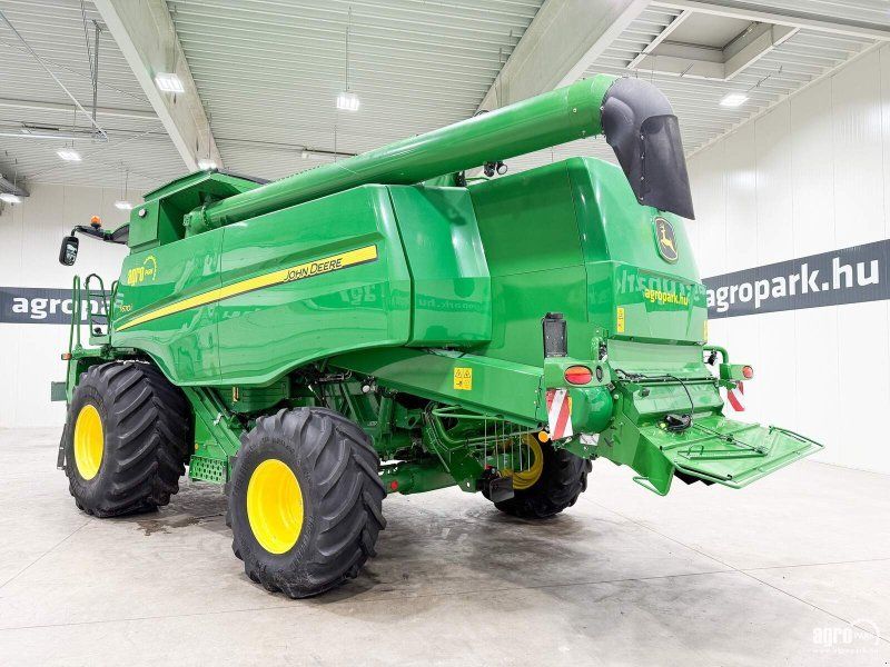John Deere T670i 6 walkers, 9.15m 630X Vario header, trailer, side knives,