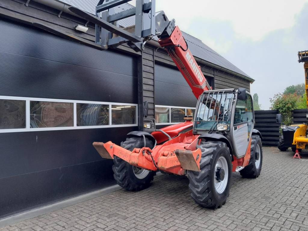 Manitou MT 1030 S T verreiker met vorken Lage uren!