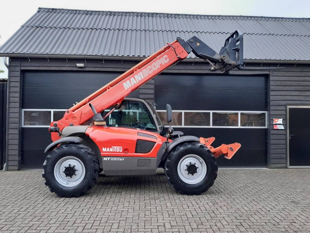 Manitou MT 1030 S T verreiker met vorken Lage uren!