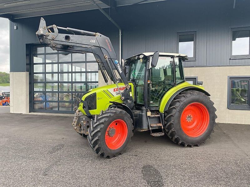 Claas Arion 420 CIS mit Trima Frontlader