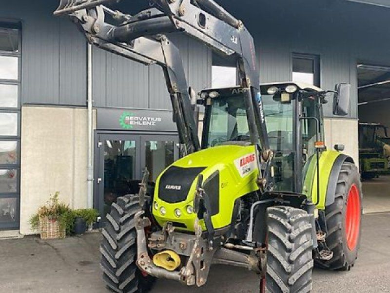 Claas Arion 420 CIS mit Trima Frontlader