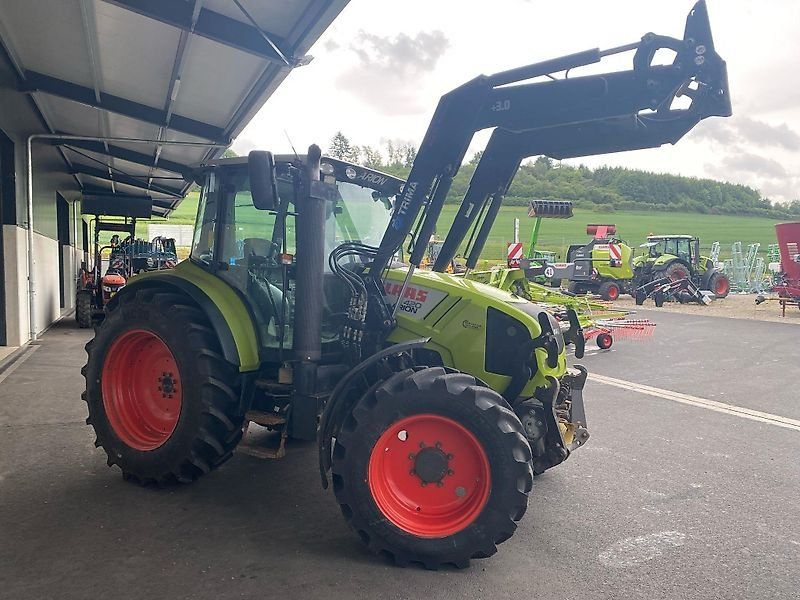 Claas Arion 420 CIS mit Trima Frontlader