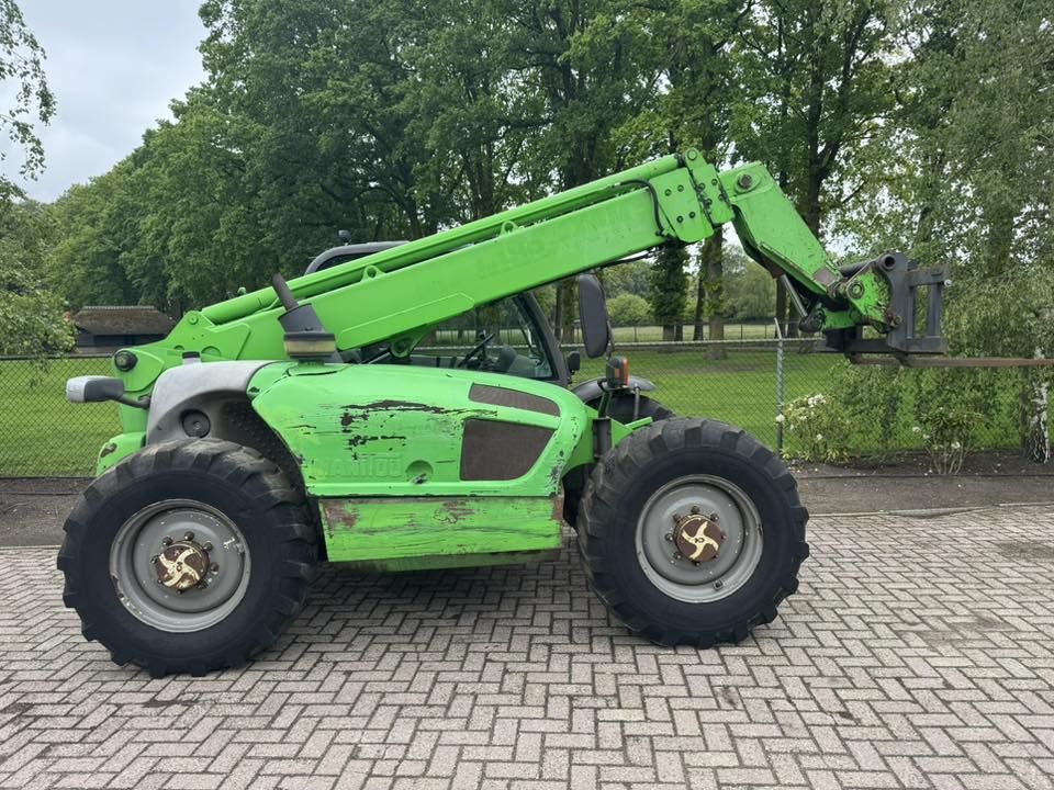 Manitou MT932 Verreiker lader