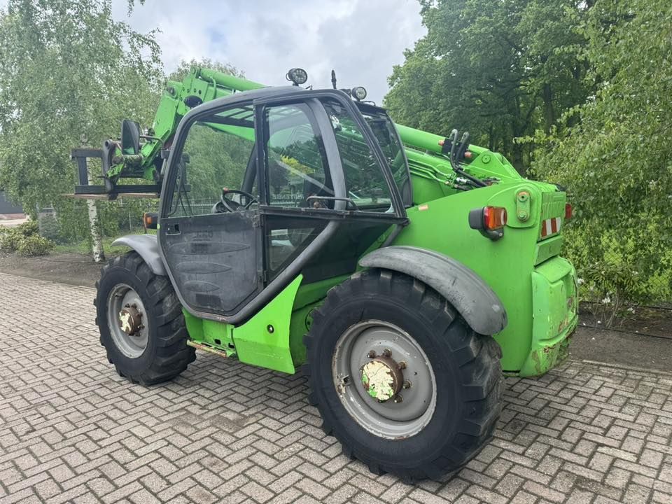 Manitou MT932 Verreiker lader