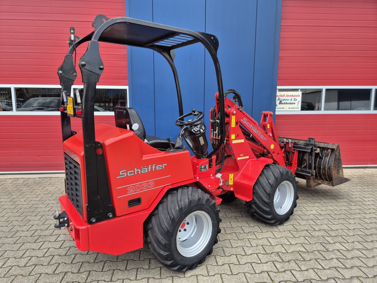 SCHAFFER 2033 SHOVEL MET BAK, PALLETVORKEN EN KENTEKEN