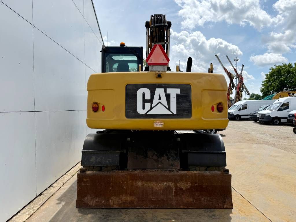 CAT M315D - Triple Boom / Quick Coupler
