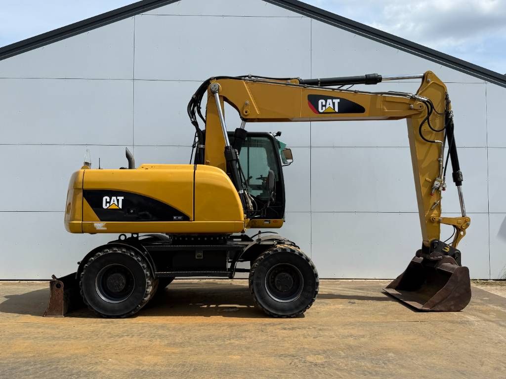 CAT M315D - Triple Boom / Quick Coupler