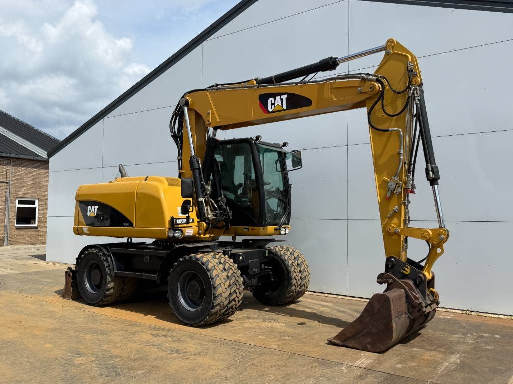 CAT M315D - Triple Boom / Quick Coupler