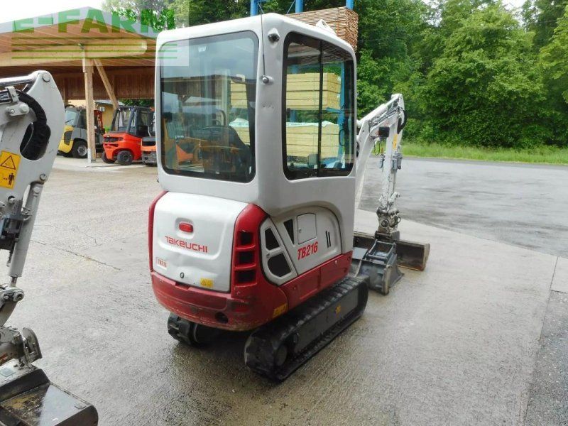 Takeuchi tb 216 ( 1.865kg ) powertilt + 3 löffel