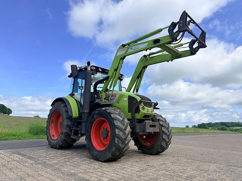 Claas Arion 410 mit Frontlader
