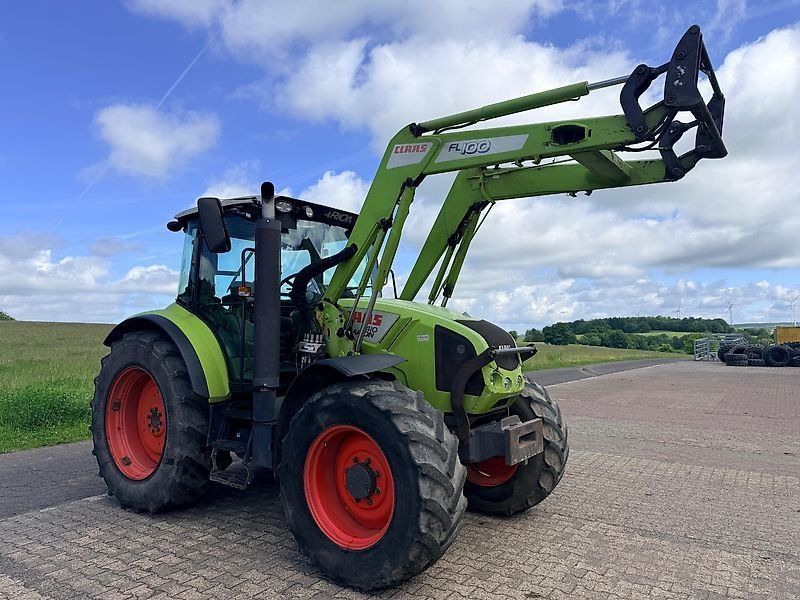 Claas Arion 410 mit Frontlader