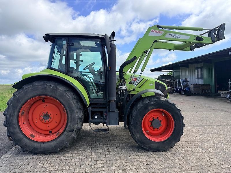 Claas Arion 410 mit Frontlader