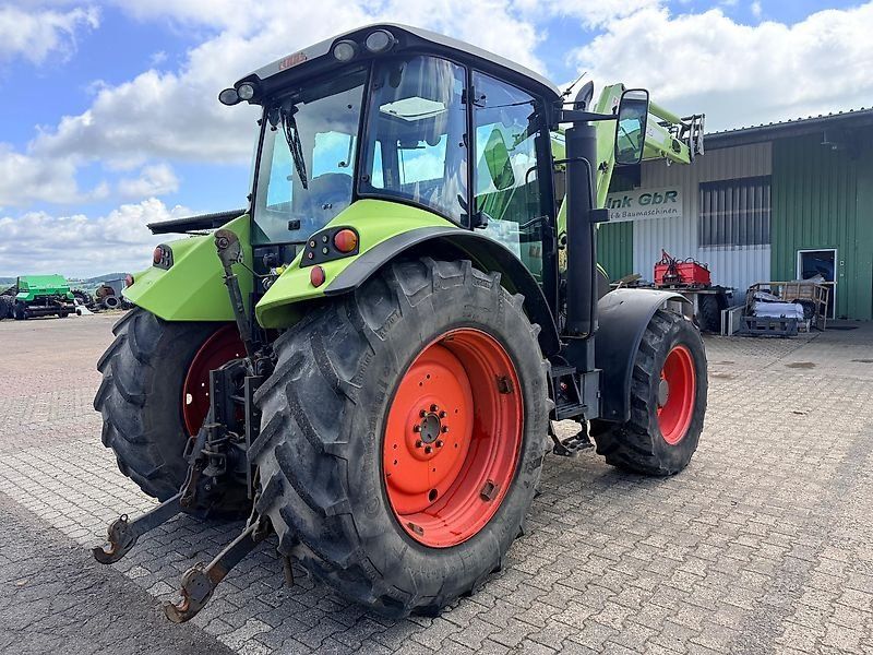 Claas Arion 410 mit Frontlader