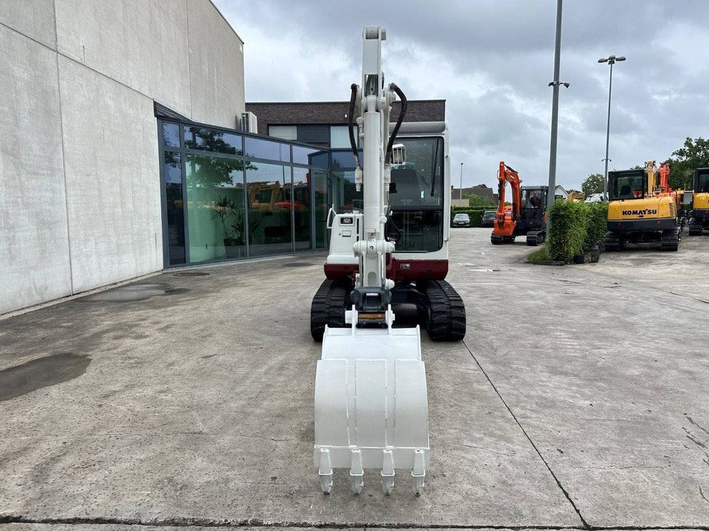 Midi excavator Takeuchi TB140C Diesel 2014