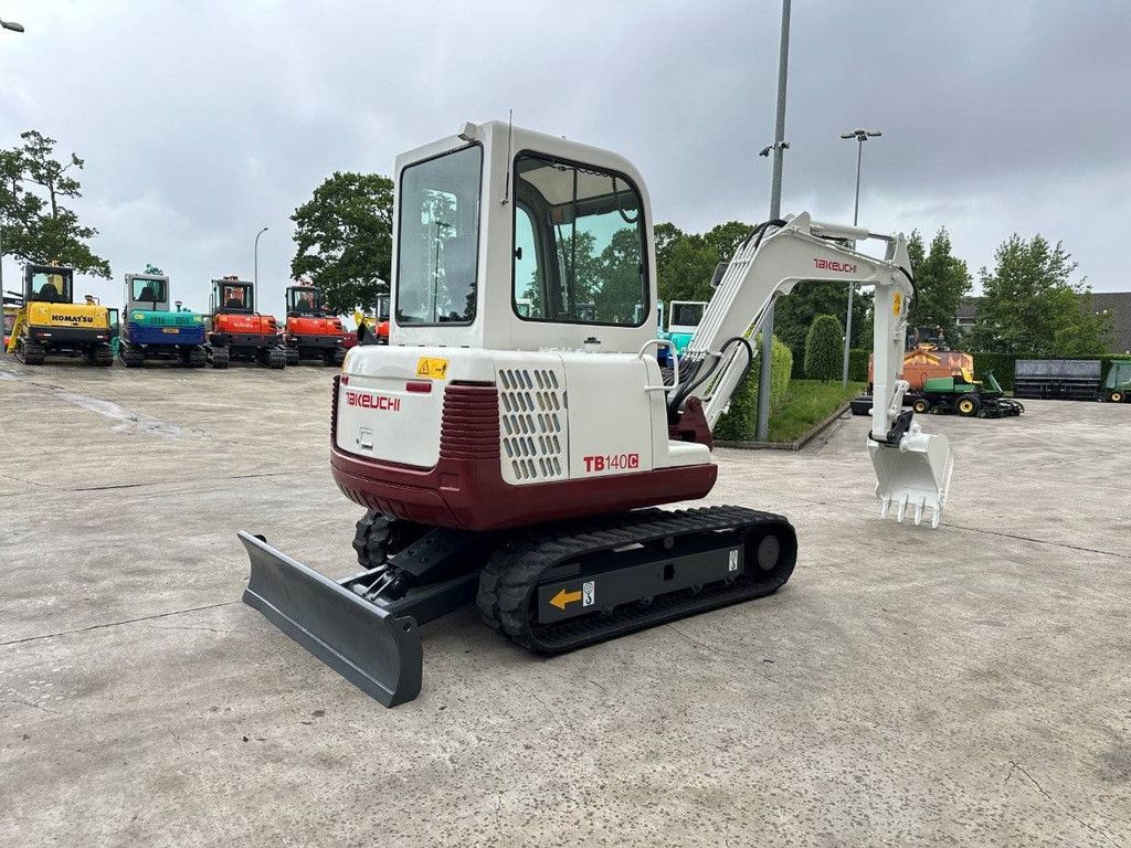 Midi excavator Takeuchi TB140C Diesel 2014