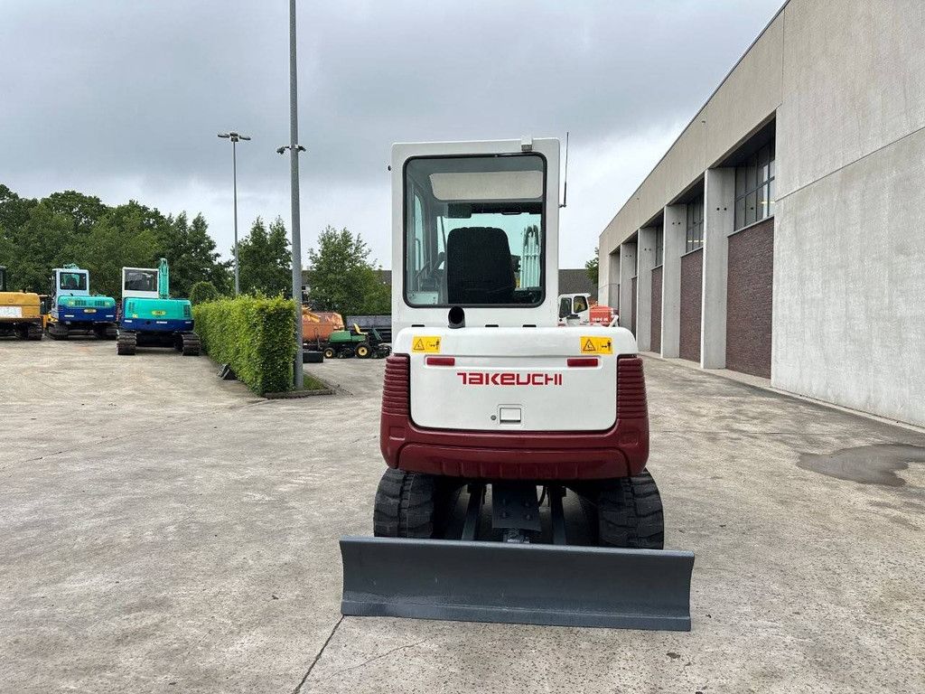 Midi excavator Takeuchi TB140C Diesel 2014