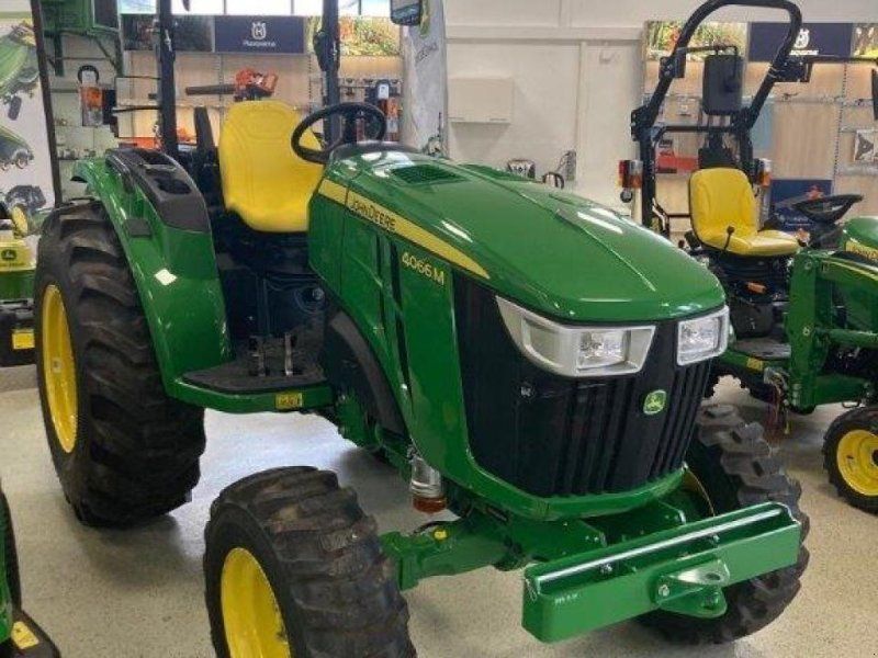 John Deere 4066M Aktion